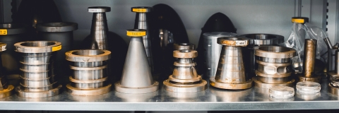 Different shaped metal objects on a counter