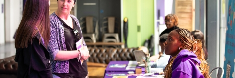 Parents and students talking with staff at the information fair  - Open Day 2023