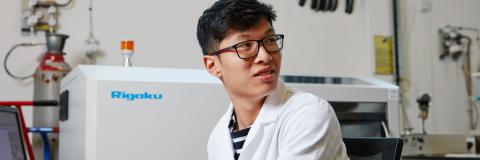 Male University of Portsmouth PhD student in X-Ray Fluorescence laboratory