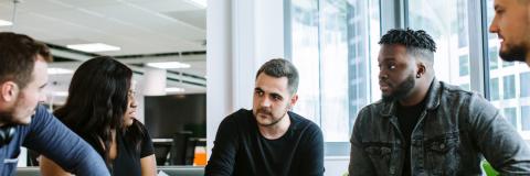 Staff members in a meeting