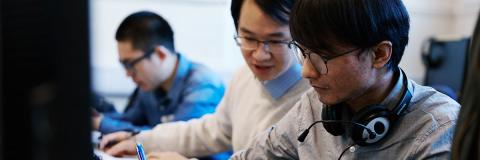 two students working at computers