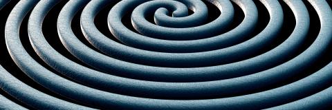 Illustration of 2 merging black holes and the gravitational waves that ripple outward