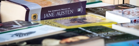 Close-up of paperback books on a table