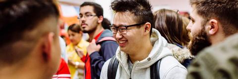 male student from singapore laughing at festival of cultures 2017