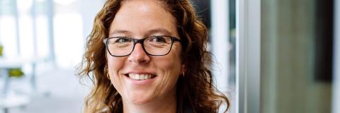 Staff member in foyer of Eldon Building, Portsmouth