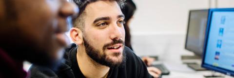 Students working on shared desk