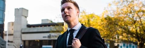 A male student in Guildhall Square, Portsmouth.