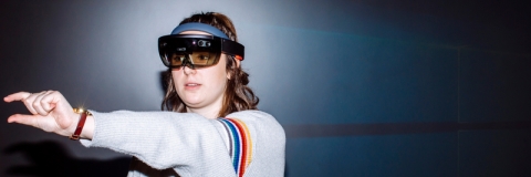 Student wearing augmented reality glasses