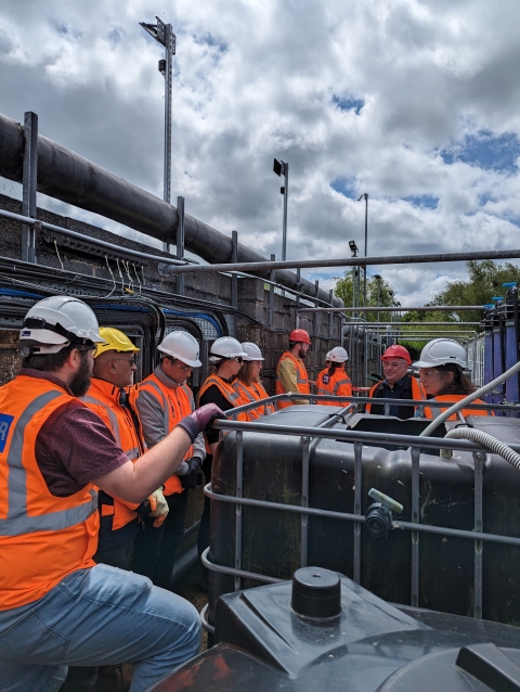 Walk through with collaborators at wastewater site