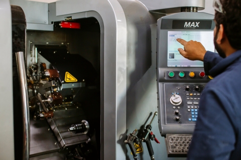 Researcher using Manufacturing Lab equipment