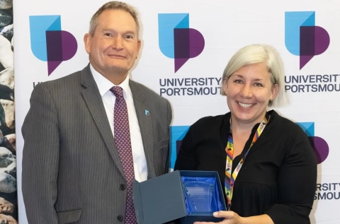 Headshot of Nicola Crowson with vice chancellor smiling