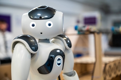 Robot person looking towards the camera