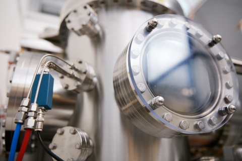 A close up of a flue with a closed transparent valve