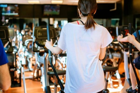 A woman using the equipment at a University of Portsmouth Gym