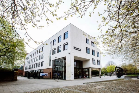 Outside view of Dennis Scamia building on campus