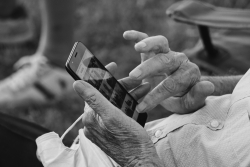 elderly person on phone
