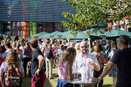 Large crowd with bunting