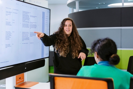 Mechanical engineering student, Holly Esson presents to fellow students in a technology enhanced learning space