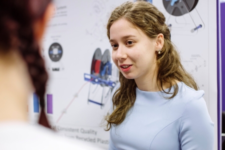 Student mid conversation at Engineering Project Day