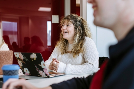 Student studying in group with laptop