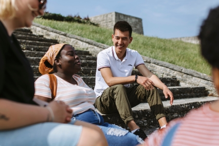 Students socialising by Southsea common