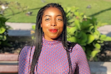 Image of Aku Mandeya stood in park