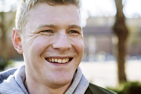 Student smiling at camera