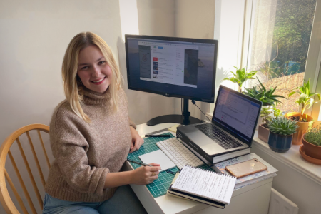 Vanessa sitting at desk